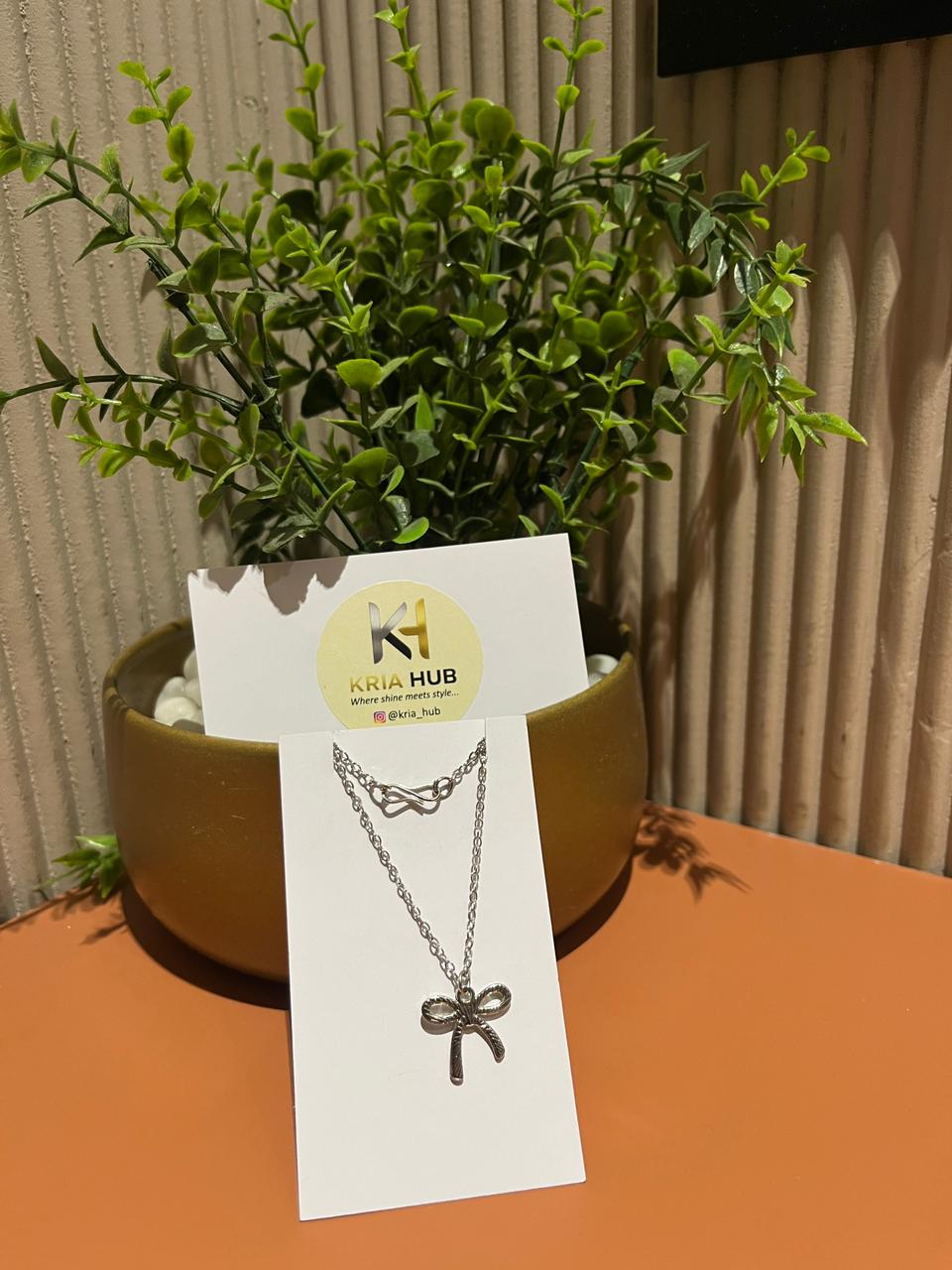 Silver Bow Charm Necklace